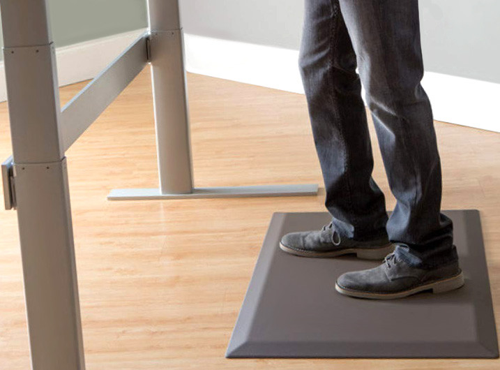 Man Standing On Anti-Fatigue Mat